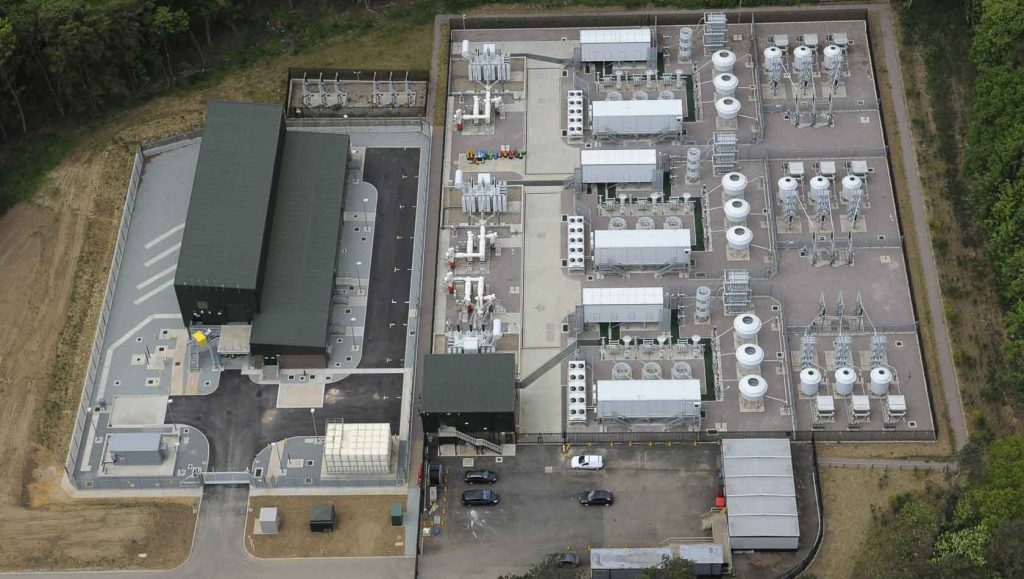 Aerial photo of a grey industrial building